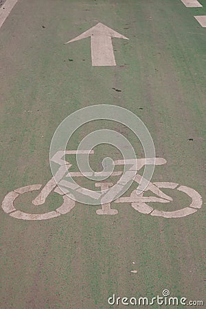 Bicycle way symbol on asphalt road surface Stock Photo