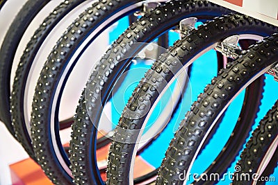 Bicycle snow tire with metal studs in store Stock Photo