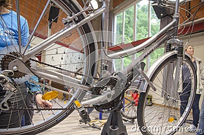 A bicycle workshop offers a space in which bicycles can be repaired Editorial Stock Photo