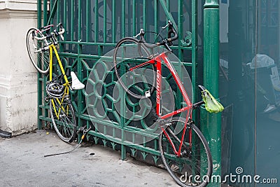 Bicycles chained to gate London Editorial Stock Photo