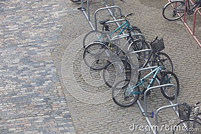 Bicycles chained up to railings Stock Photo