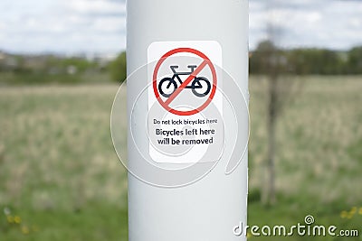 Bicycles left here will be removed sign warning for cyclists Stock Photo