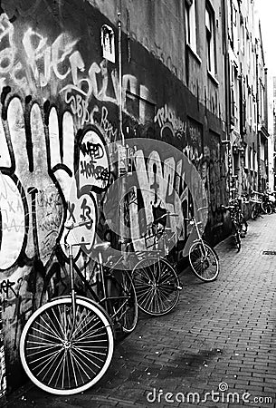 street photography with bicycles in Amsterdam city Holland - black and white photography Stock Photo