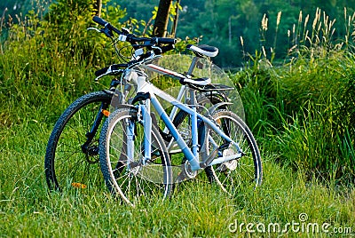 Bicycles parked near tha lake Stock Photo