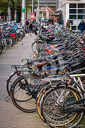 Bicycles parked in the streets of Amsterdam, the Netherlands. Green and sustainable transport. Alternative transportation Editorial Stock Photo