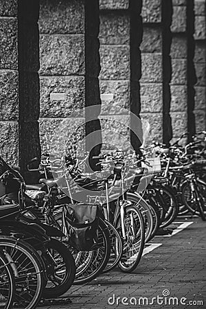 Bicycles parked in the streets of Amsterdam, the Netherlands. Green and sustainable transport. Alternative transportation Editorial Stock Photo
