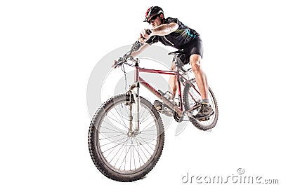 Bicyclist on a dirty bike Stock Photo