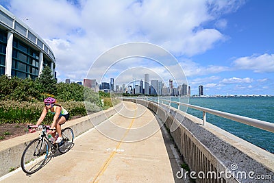 Bicyclist riding along Chicago`s lakefront Editorial Stock Photo