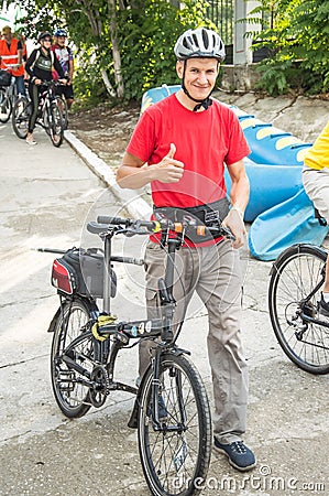 Bicyclists, adults and children, their portraits Editorial Stock Photo