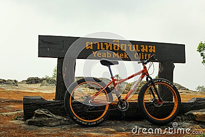 The bicyle is in front of signage. Editorial Stock Photo