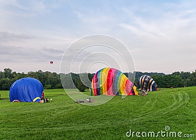 Three balloons in deflating phase Editorial Stock Photo