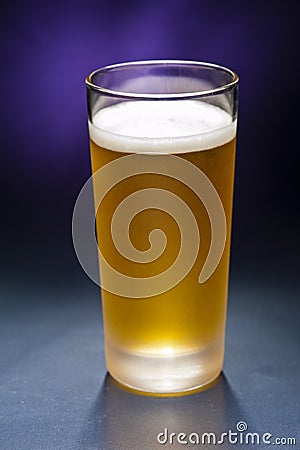 Bier glasses in front of a colorful background Stock Photo