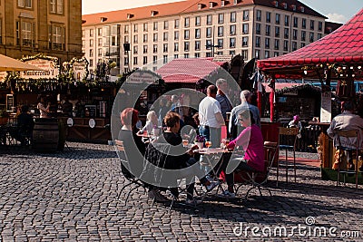 Biergarten at Altmarkt. People in a beer garden pub. Editorial Stock Photo