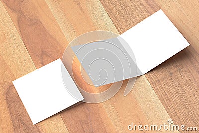 Bifold square brochure mock up on wooden background. 3D illustrating. Stock Photo