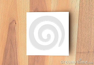 Bifold square brochure mock up on wooden background. 3D illustrating. Stock Photo