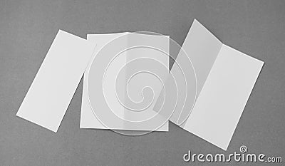 Bifold white template paper on gray background . Stock Photo