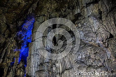 Big Azishskaya cave with speleothem, stalactites, stalagmites and stalagnates Stock Photo