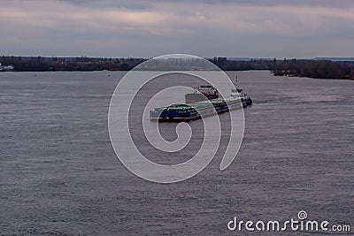 Big barge and ship on river Dnieper Editorial Stock Photo