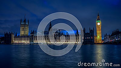 Big Ben and Houses of Parliament at dusk from the bank of river Thames, London, UK Stock Photo