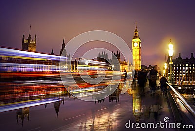 Big Ben and houses of Parliament at sunset and traffic lights. Stock Photo