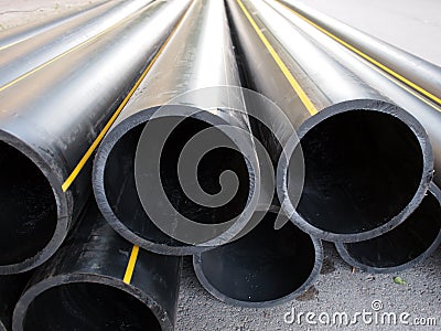 Big black pipe closeup plastic large diameter for the repair Stock Photo