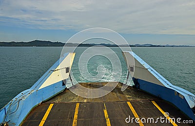 Big Blue Passenger Ferry Boat goes on the sea near Trad Island Stock Photo
