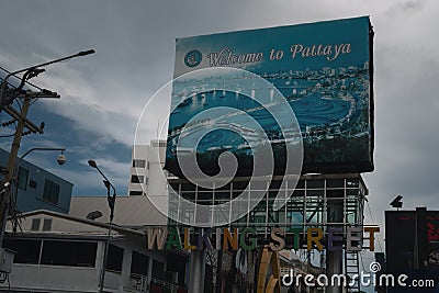 The big,blue sign above the entrance of Walking Street Editorial Stock Photo