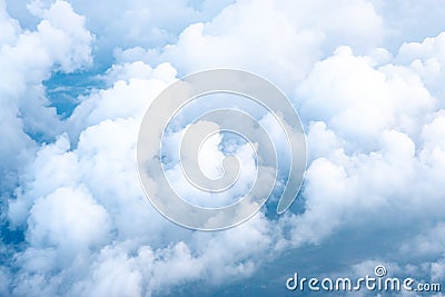 Big Blue sky and Cloud Top view from airplane window,Nature back Stock Photo