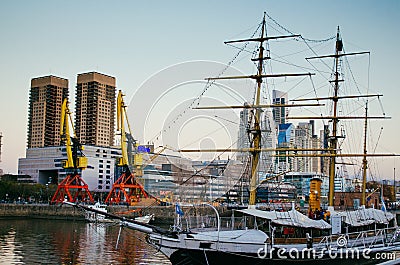 Big boat parked in a business area of Puerto Madero with a view to RÃ­o de la Plata and near the iconic Puente de la mujer Editorial Stock Photo