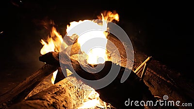Close up of a burning firewood in the dark Stock Photo