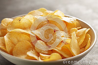 Big bowl of potato chips with crab taste on the table. Stock Photo