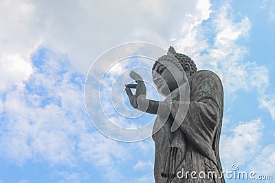 Big Buddha statue ancient on blue sky background Stock Photo