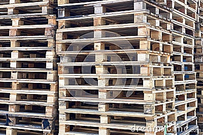 Big bunch of used wooden cargo pallets Stock Photo