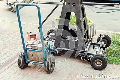 Big camera crane steel counterweight balance. Stock Photo