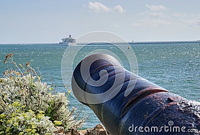 Big Canon aimed out into Plymouth Harbor in Cornwall, England Editorial Stock Photo