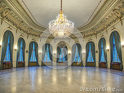 Big castle dancind room with candelabra in th middle. Castle interior. Empty room Stock Photo