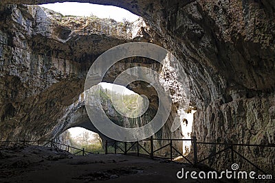 Big cave with top openings Stock Photo