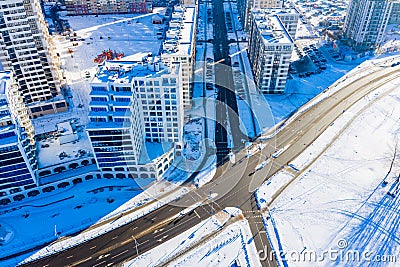 Big city life in a new residential district in Minsk. Sunny weather on winter day. Urban lifestyle in town Editorial Stock Photo