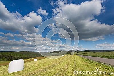 Big cloudscape over a field in Germany. Stock Photo