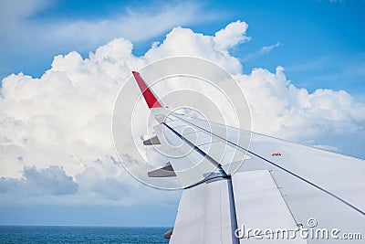 Big clound and seascape View from Airplane Window Stock Photo