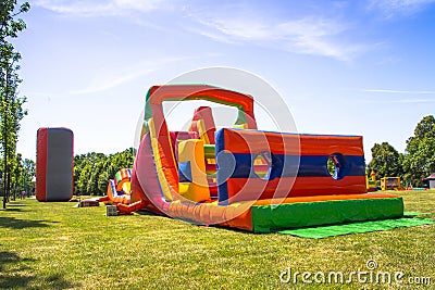 Big colorful and tall inflatable rubber obstacle course Stock Photo