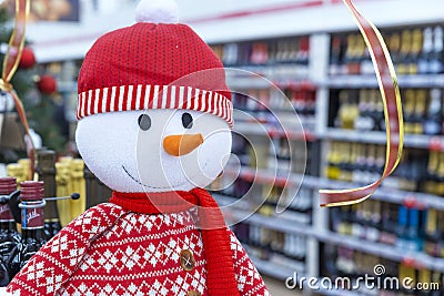 Big colorful toy Christmas snowman in the wine department Editorial Stock Photo