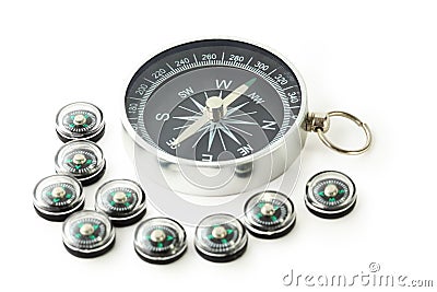 Big compass with eigth black small compasses Stock Photo