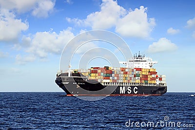 Big container ship of MSC Company sailing in open waters. Editorial Stock Photo