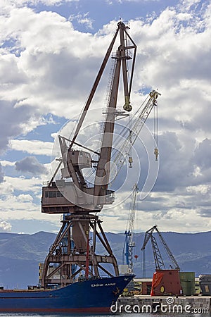 Big cranes, harbor, freight ships in Rijeka, Croatia Editorial Stock Photo