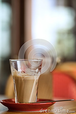 Big cup of coffee latte on a table Stock Photo