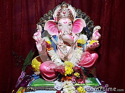 Lord Ganesha clay idol installation at home in Konkan India Stock Photo