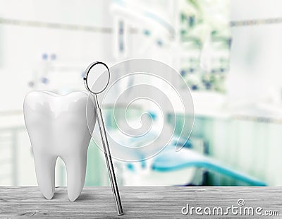 Big tooth and dentist mirror, medical concept Stock Photo