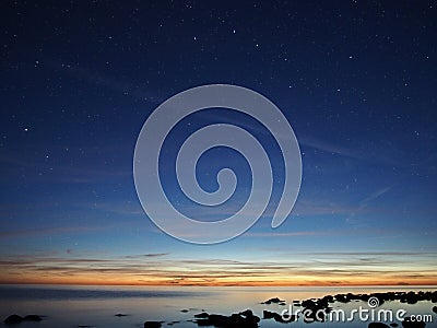 Big Dipper constellation stars observing over sea Stock Photo