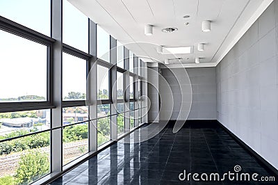 Big empty office space with window wall. Day light illumination. Stock Photo